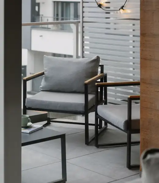 comfortable-gray-chairs-on-an-apartment-balcony